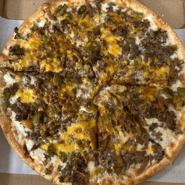The Ultimate Steak Bomb Pizza.